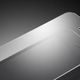 Illustration for article titled The Defective Tech That Killed the iPhone's Sapphire Screens